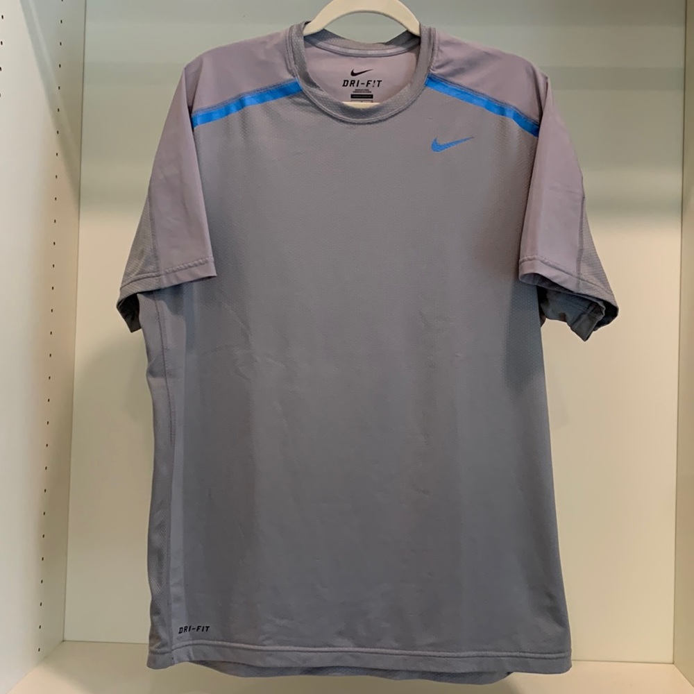 Nike Dri fit top. Size large. Lt gray with lt blue detailing. Great condition!